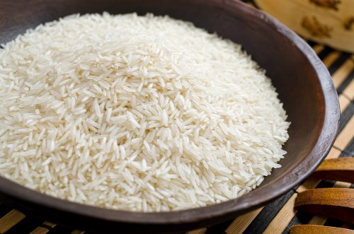 A bowl of long grain basmati rice.